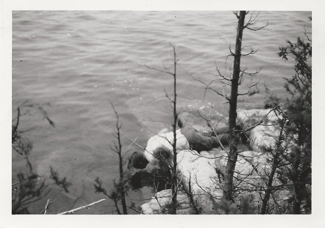 Working among the rocks at the river's edge.
